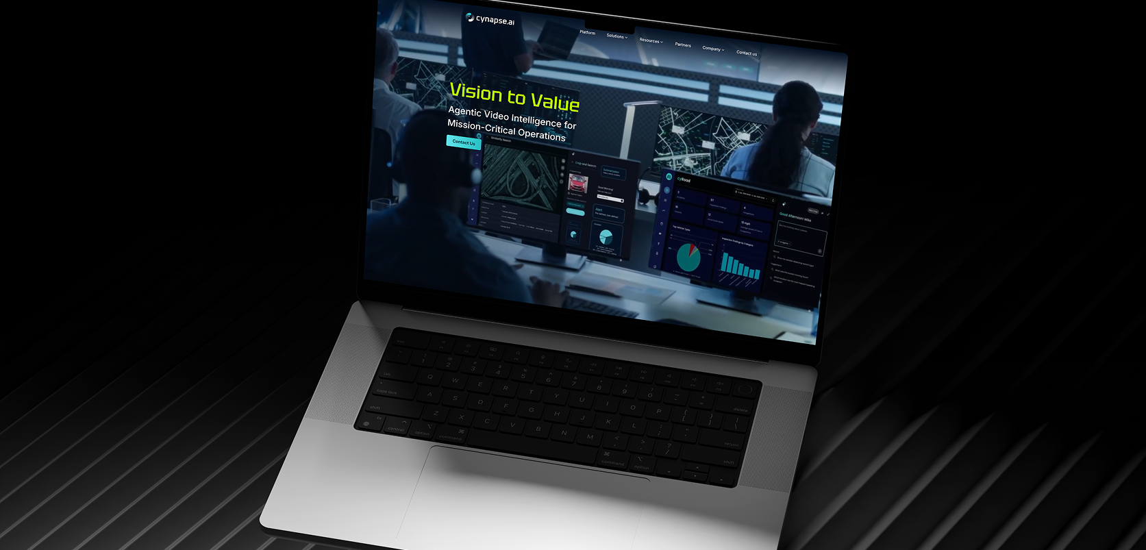 Laptop showing Cynapse.ai hero page with vision and analytics dashboard